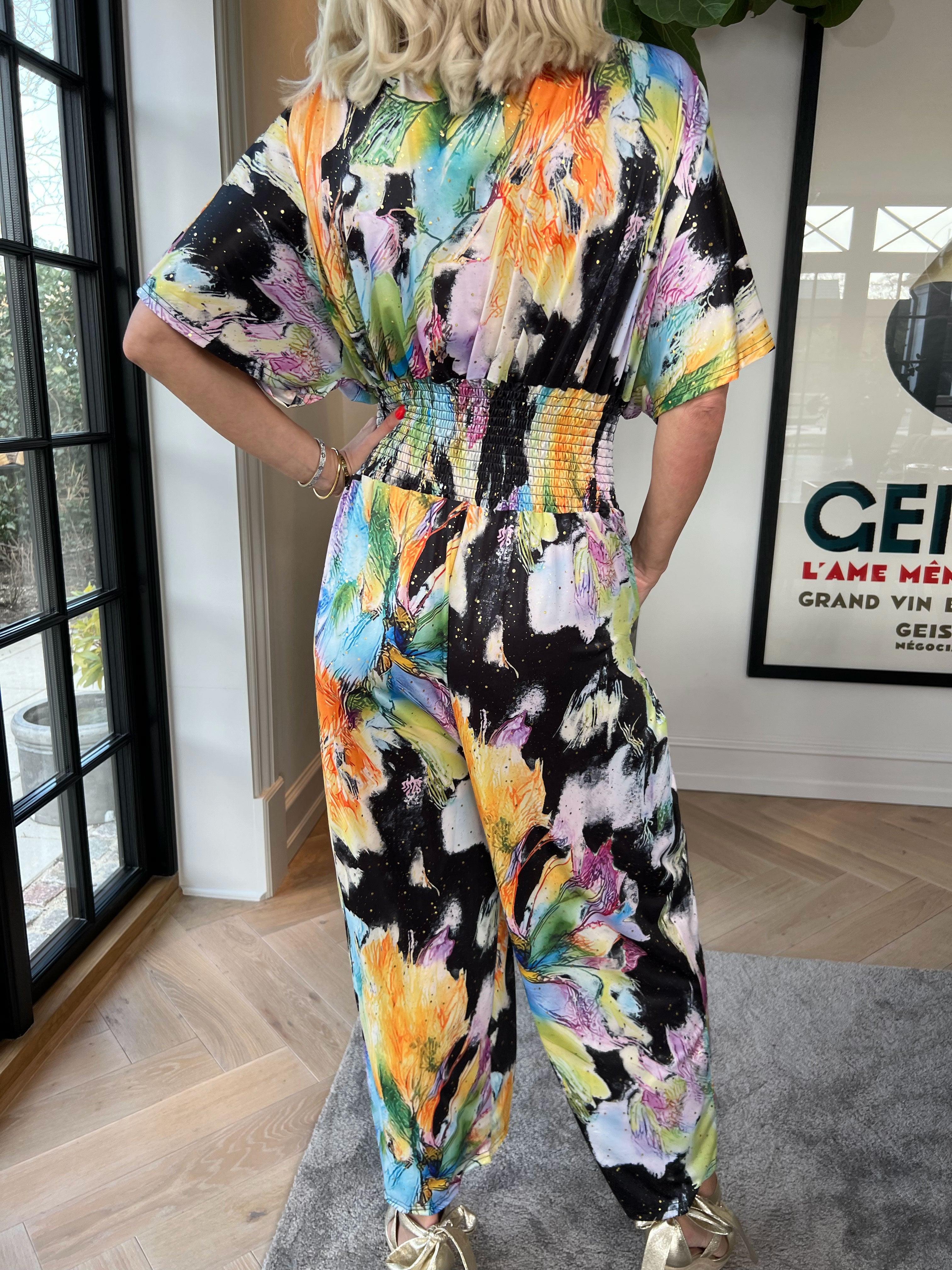 Pams Print Jumpsuit - Elastisk mønstret buksedragt med guld støv